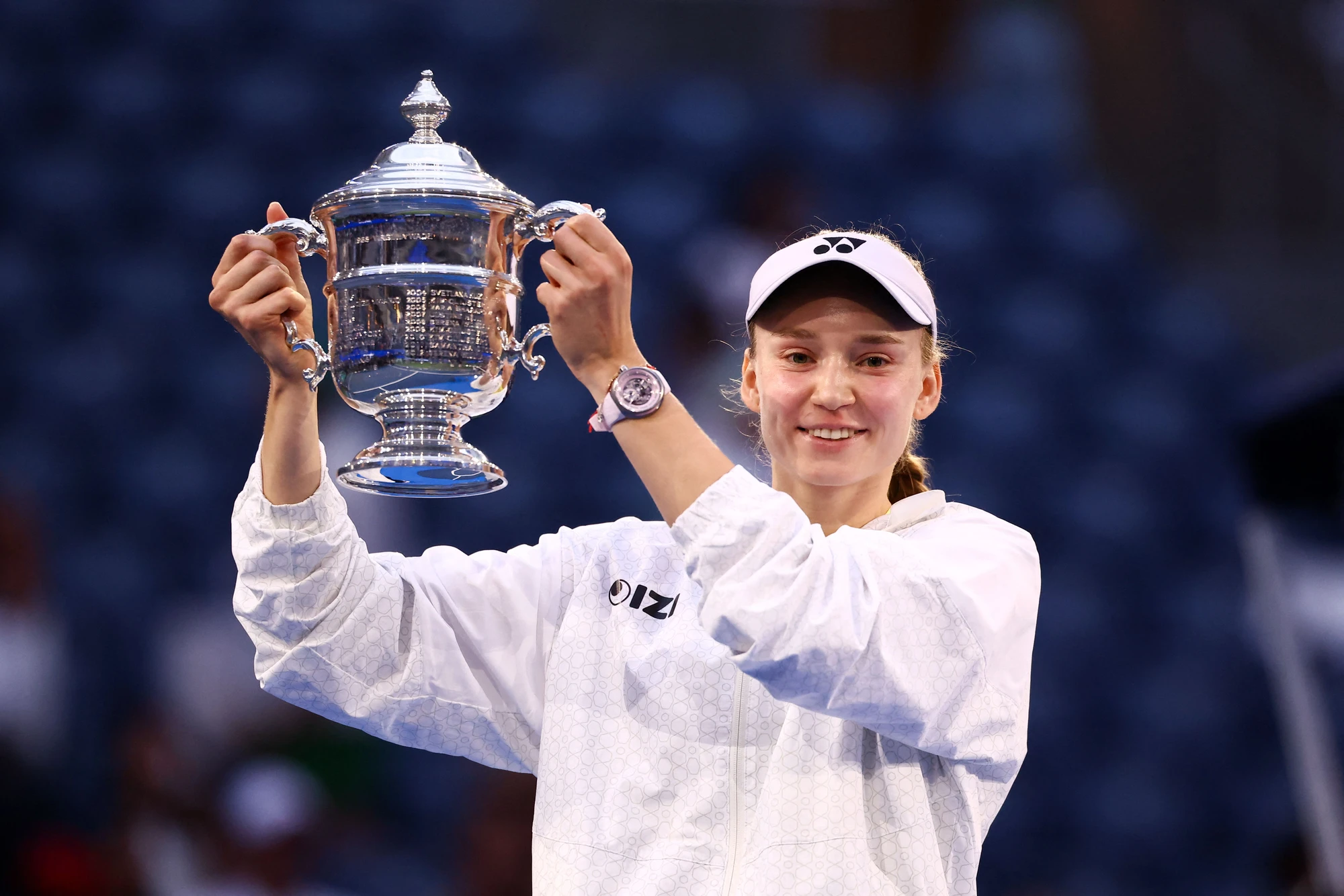 Elena Rybakina lifting the US Open trophy with her Vanguart watch visible